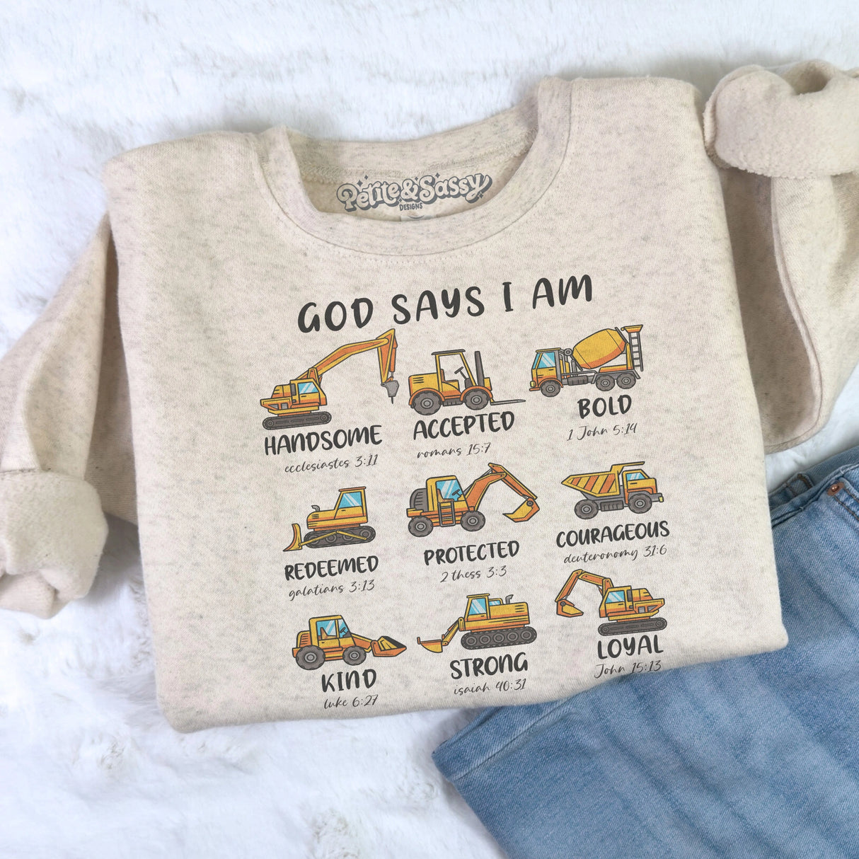 Kids natural colored sweatshirt with God Says I Am design with construction vehicles above affirmations and bibles verses to match the word