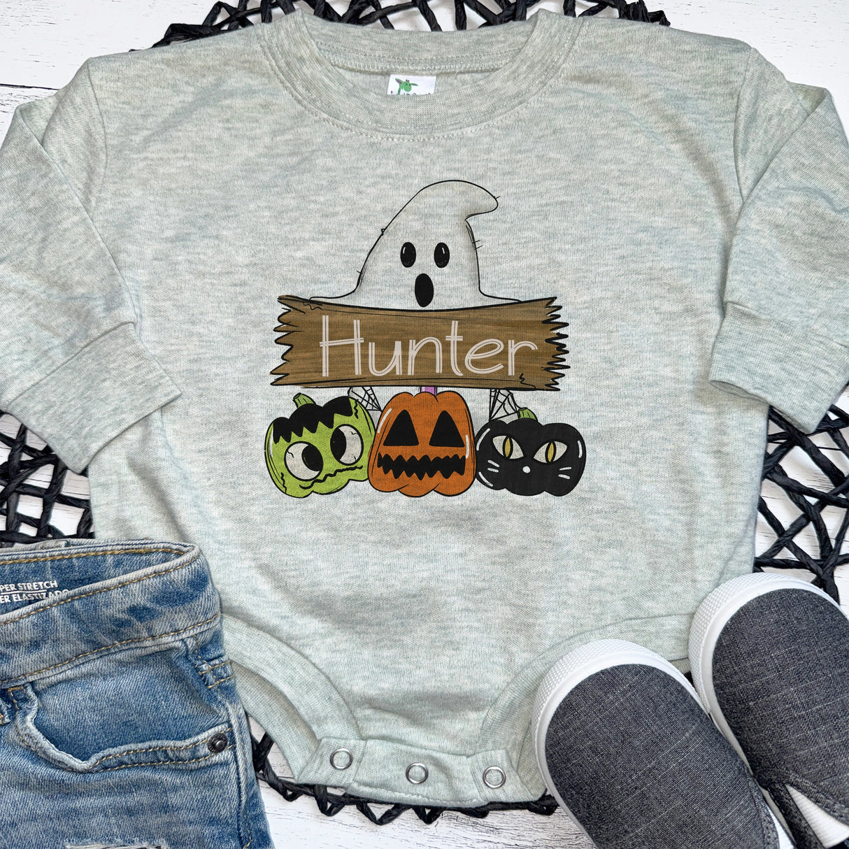 heather green baby bodysuit with ghost and custom name design