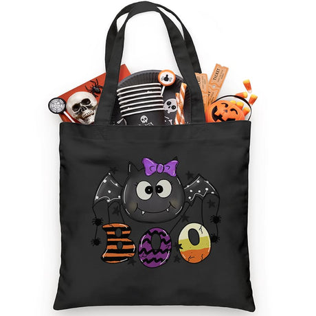 This adorable Halloween candy tote is the perfect size for little ones trick or treating. It is embellished with an adorable little bat with the words BOO. The best part is that it comes personalized with your child’s name, for FREE, to stake a claim on their candy! 