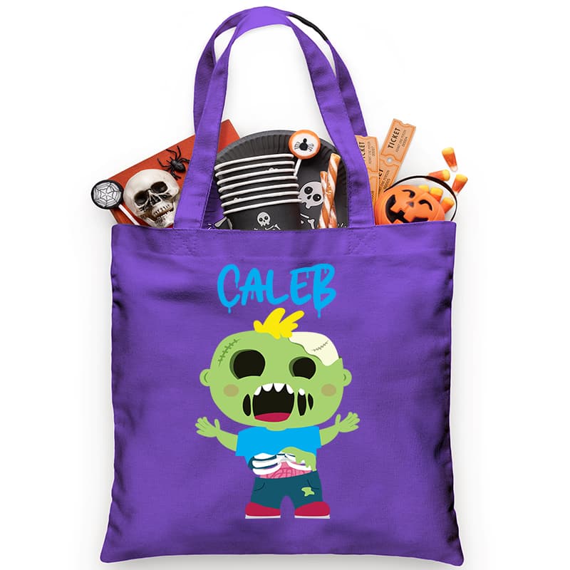 This adorable Halloween candy tote is the perfect size for little ones trick or treating. It is embellished with a screaming zombie