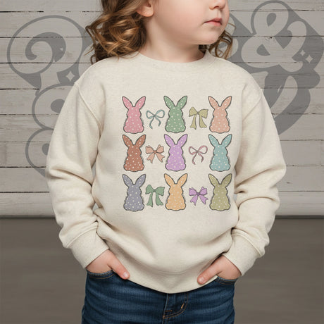 Multi colored bunny collage on kids natural colored sweatshirt