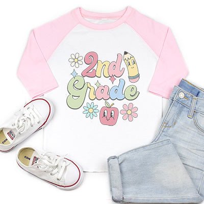 Get ready to rock the new school year with our Back to School Cartoon Grade Raglan! This design is printed using sublimation, ensuring no fading or cracking with this design. Your little one will stand out from the crowd in style. Let your personality shine with this quirky addition to your wardrobe. (No boring back-to-school outfits here!)